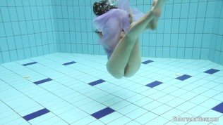 Aneta big tits and purple dress in the pool