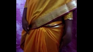 Desi Hot Girl Showing Her Assets Stripping In Saree Video